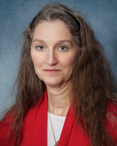 Headshot of Lisa Balbes in a bright blazer